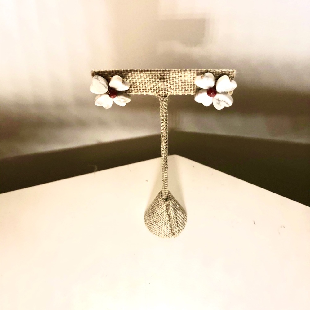 Precious resin and red coral studs.